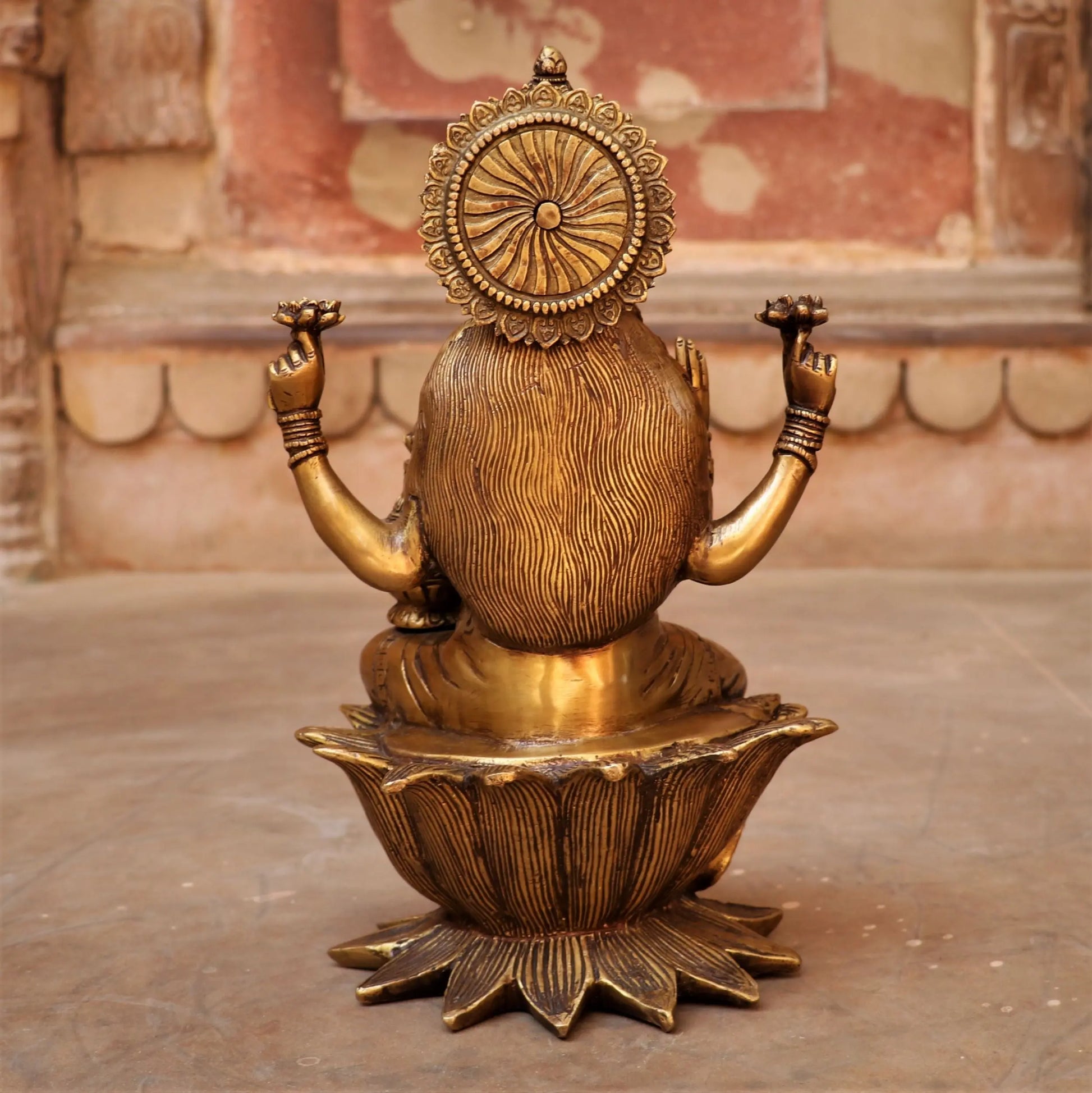 Brass Lakshmi statue sited on Lotus craftsview