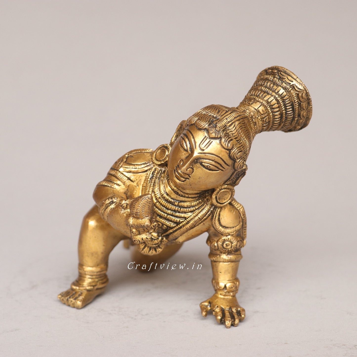 Brass Laddu Gopal Idol A Symbol of Divine Love and Playfulness