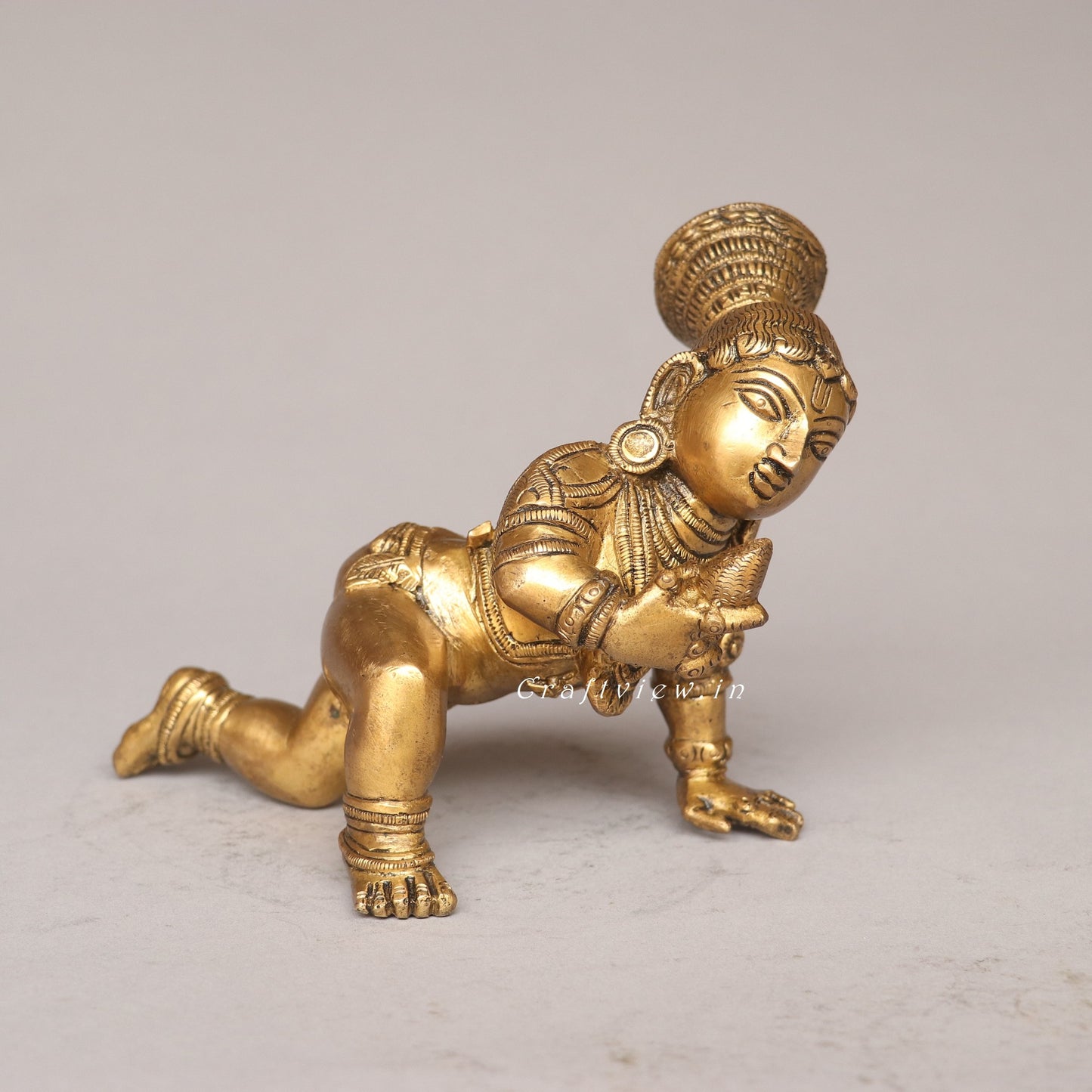 Brass Laddu Gopal Idol A Symbol of Divine Love and Playfulness