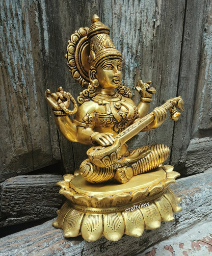 Brass Saraswati Idol sitting on lotus