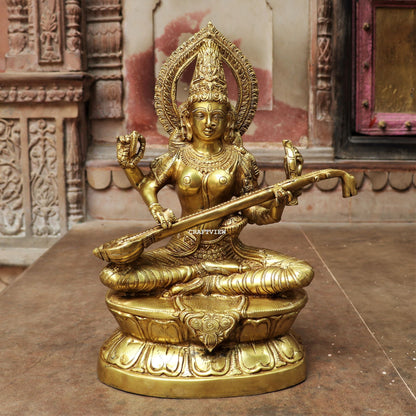 Brass Saraswati Statue Sitting On Base