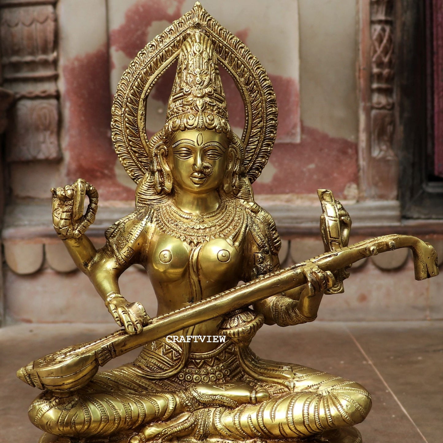 Brass Saraswati Statue Sitting On Base