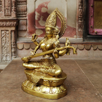 Brass Saraswati Statue Sitting On Base