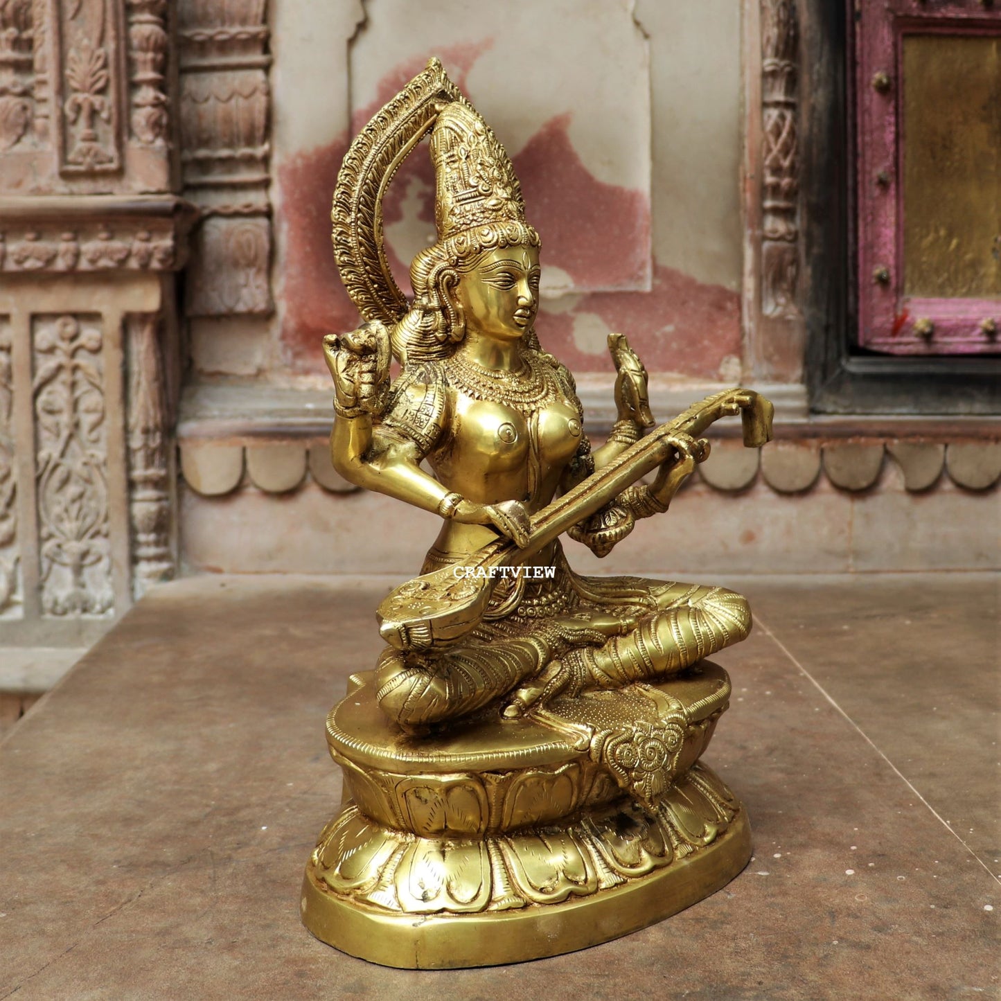 Brass Saraswati Statue Sitting On Base