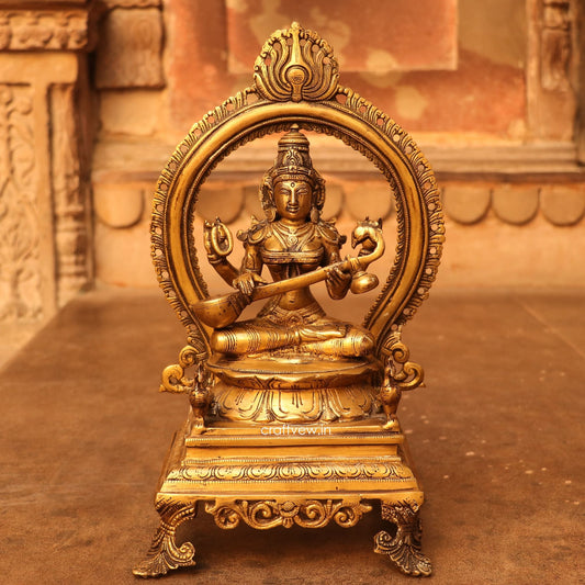 Brass Saraswathi Idol sitting on lotus Base