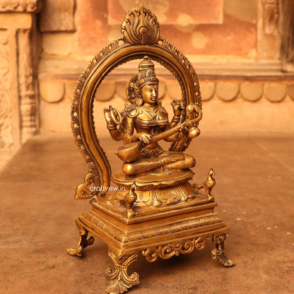 Brass Saraswathi Idol sitting on lotus Base