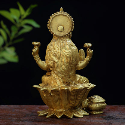 Brass Lakshmi statue sited on Lotus 7"