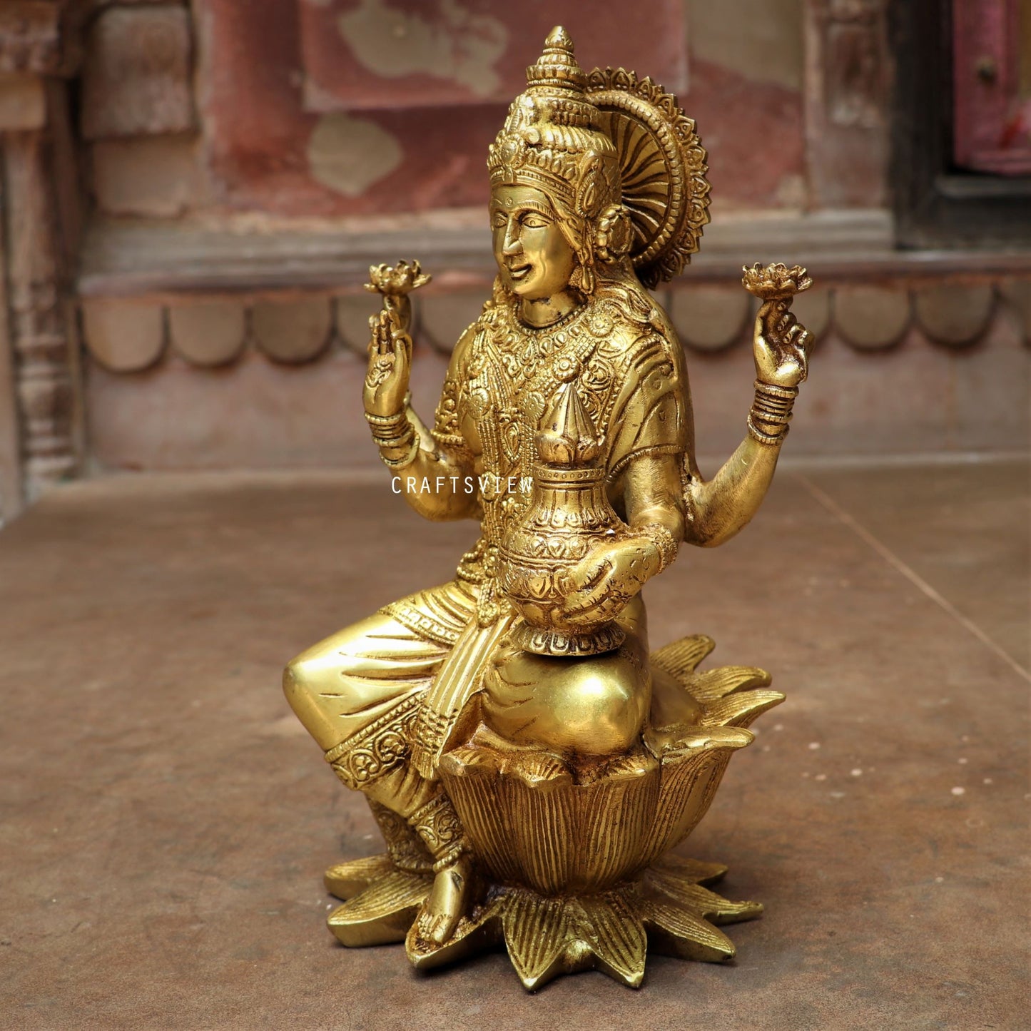 Brass Lakshmi statue sited on Lotus 12"