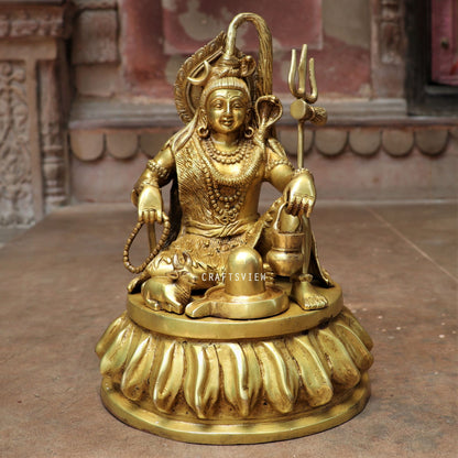 Brass Shiva Statue Sitting On Floral Base