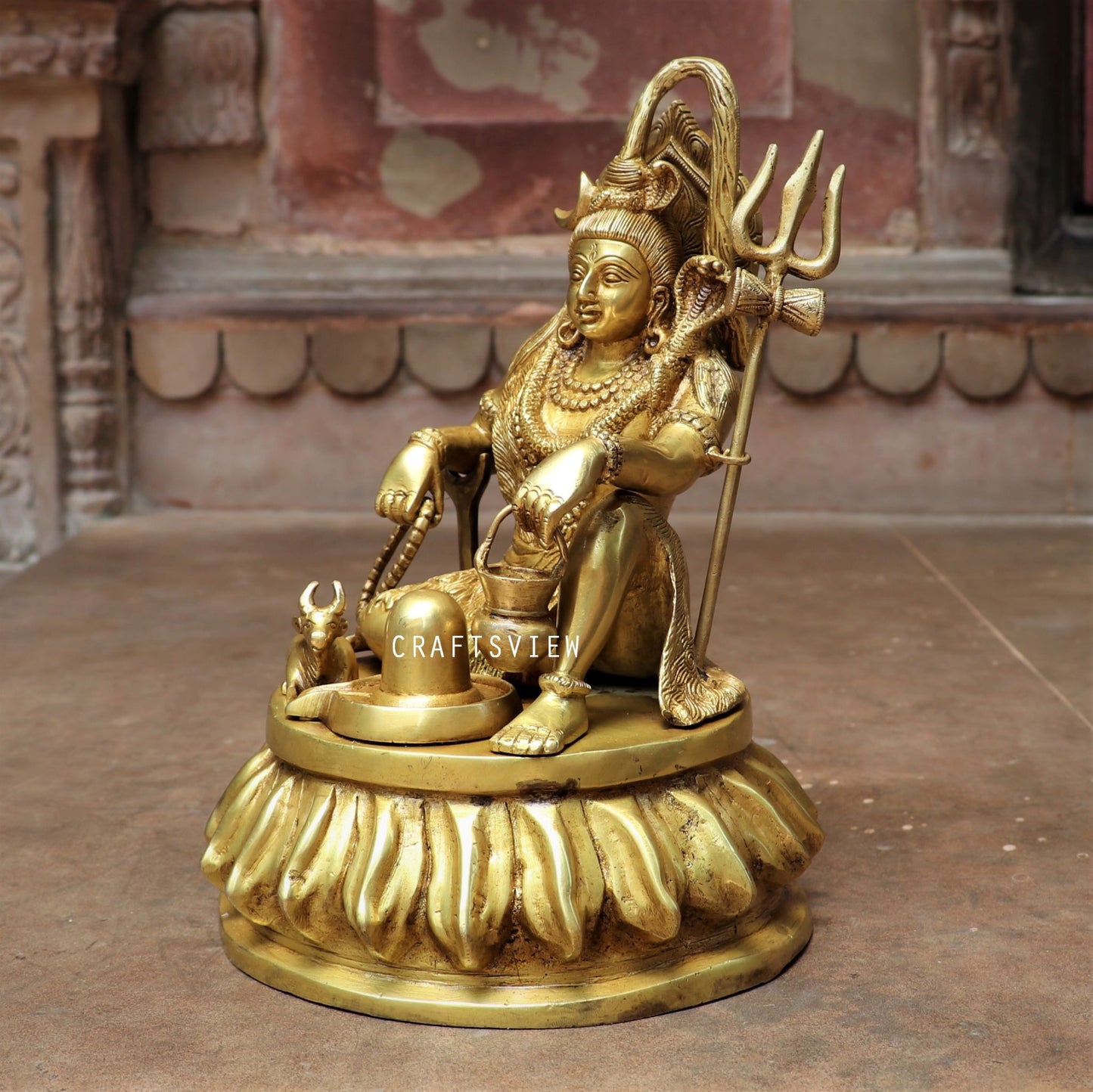 Brass Shiva Statue Sitting On Floral Base