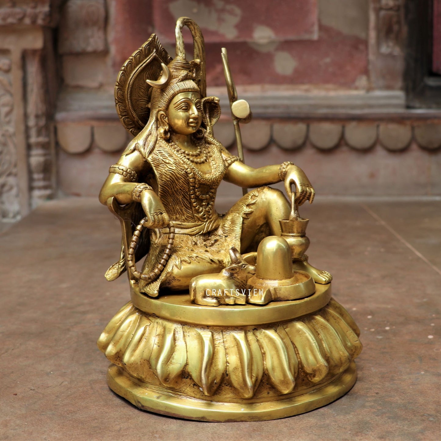 Brass Shiva Statue Sitting On Floral Base