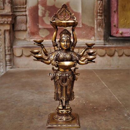 Brass Deep Lakshmi Statue Holding in Deep 16"