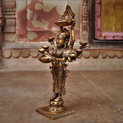 Brass Deep Lakshmi Statue Holding in Deep 16"