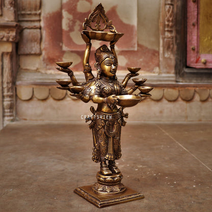 Brass Deep Lakshmi Statue Holding in Deep 16"