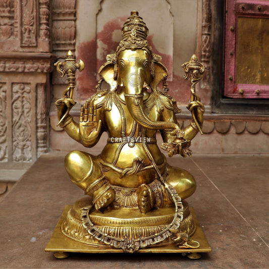 Brass Ganesha Statue Sitting On Floral Base 20"