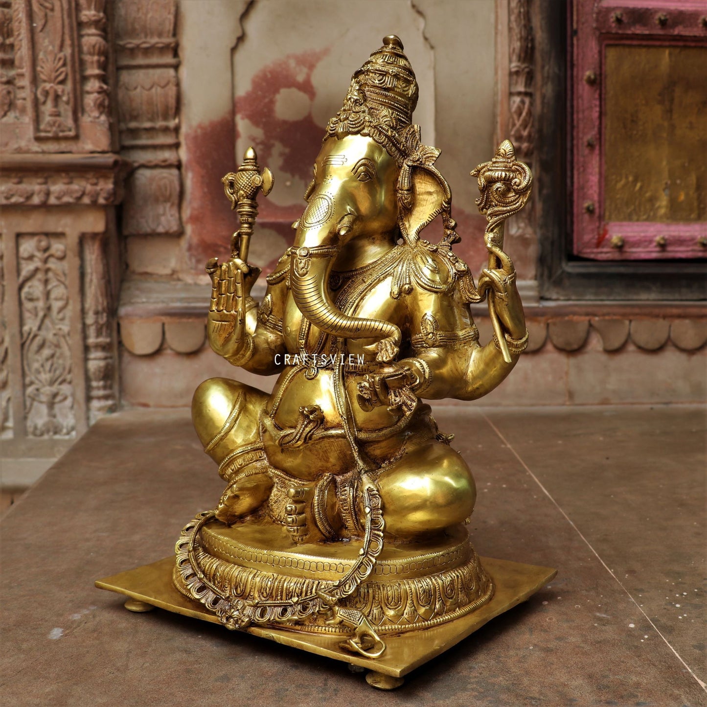 Brass Ganesha Statue Sitting On Floral Base 20"