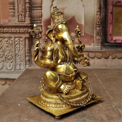 Brass Ganesha Statue Sitting On Floral Base 20"