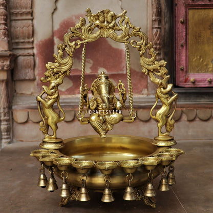 21" Brass Urli Decor with Ganesh jhula 9 wick oil Lamp