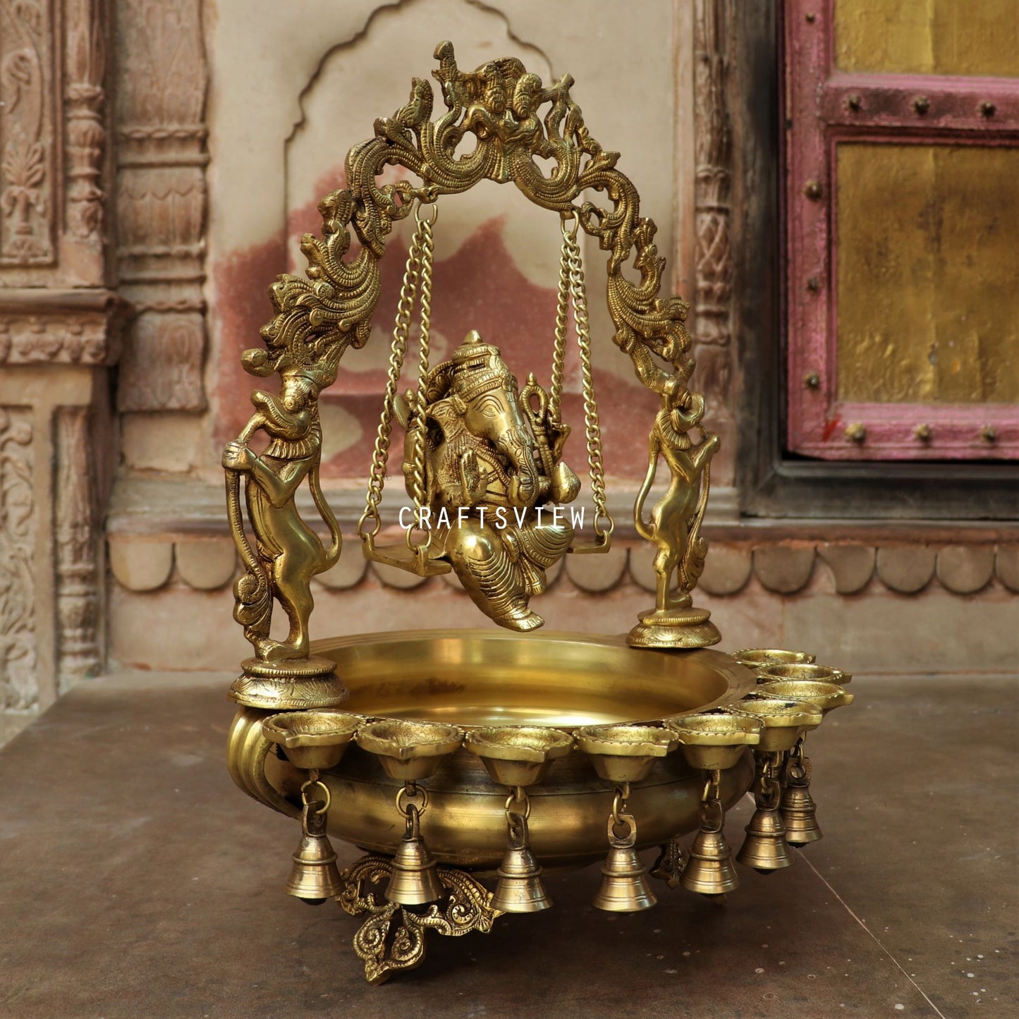 21" Brass Urli Decor with Ganesh jhula 9 wick oil Lamp