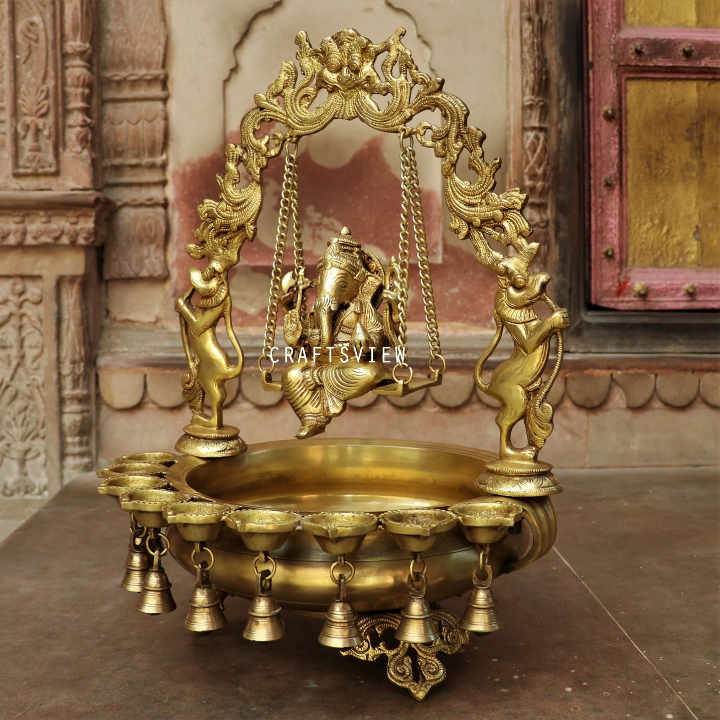 21" Brass Urli Decor with Ganesh jhula 9 wick oil Lamp