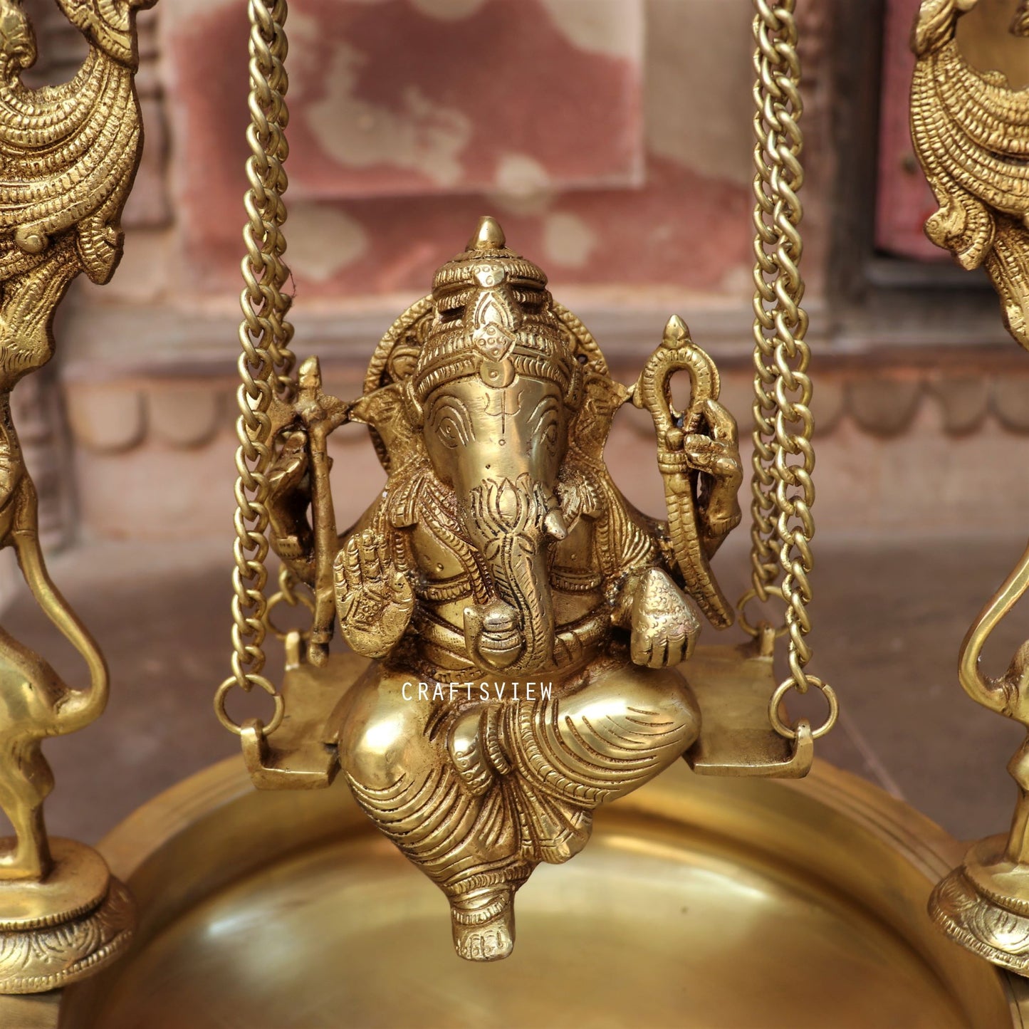 21" Brass Urli Decor with Ganesh jhula 9 wick oil Lamp