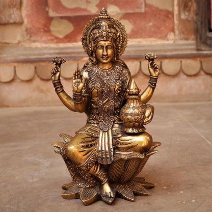 Brass Lakshmi statue sited on Lotus