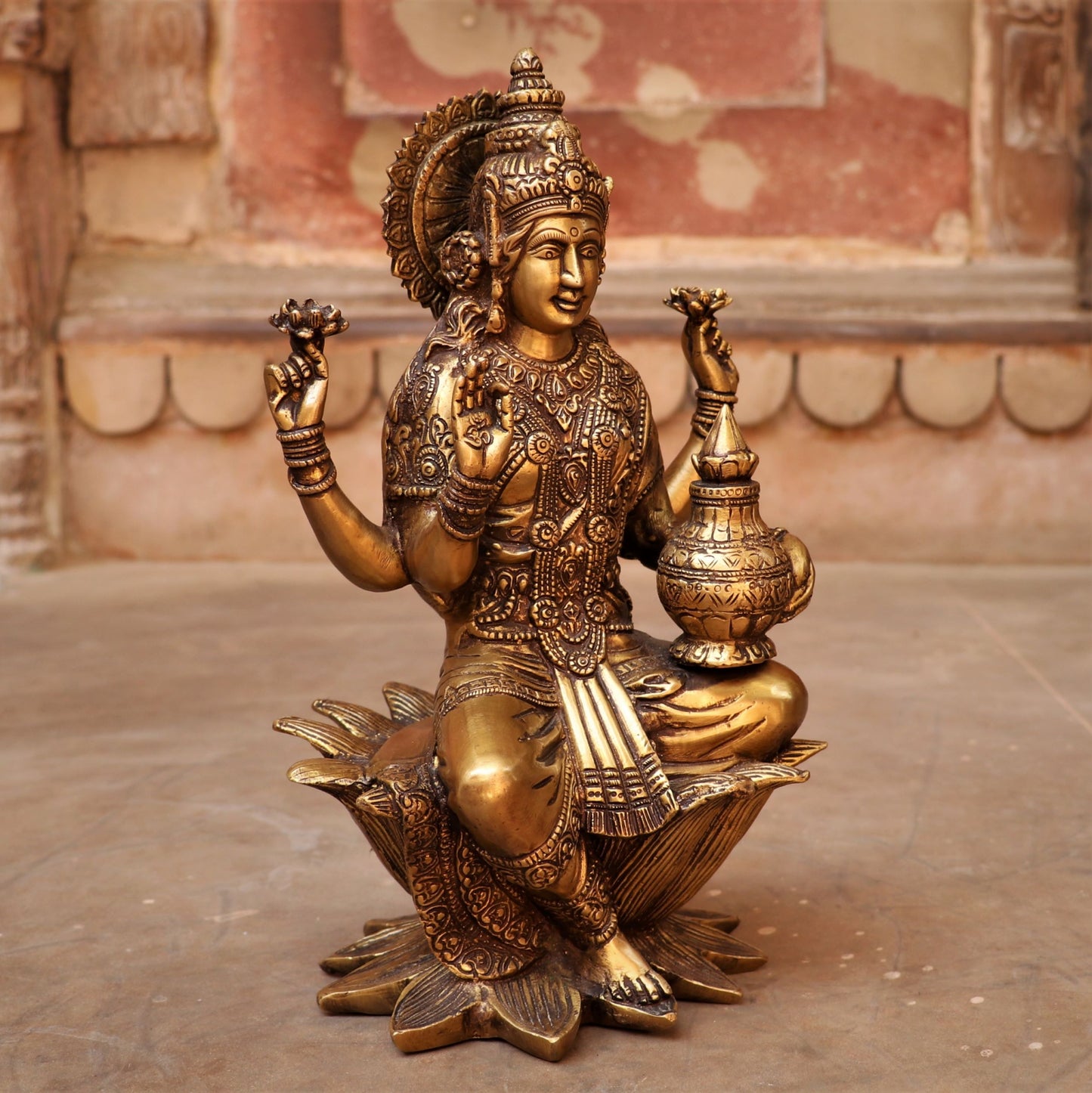 Brass Lakshmi statue sited on Lotus