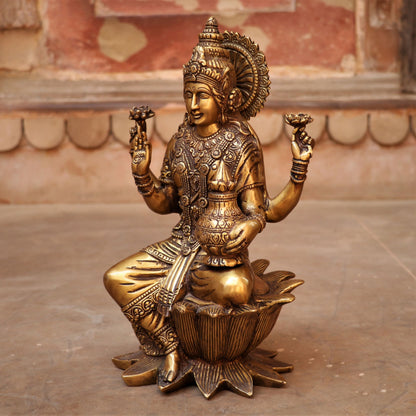 Brass Lakshmi statue sited on Lotus