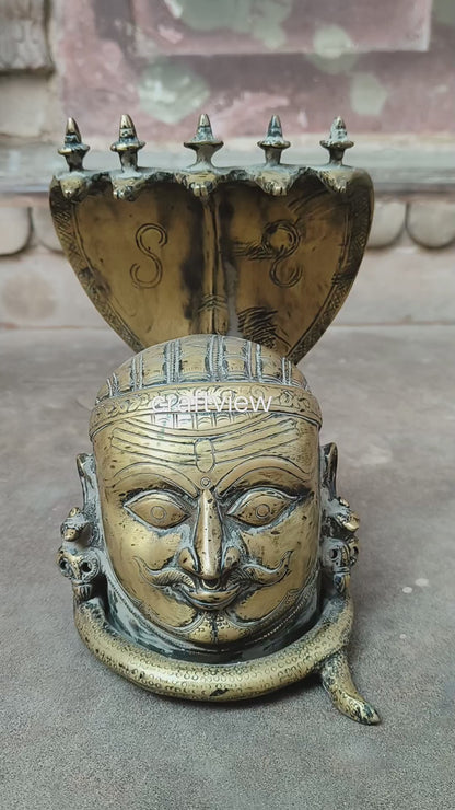 Brass Shiva Mukh lingam With Nagabharanam Table Decor